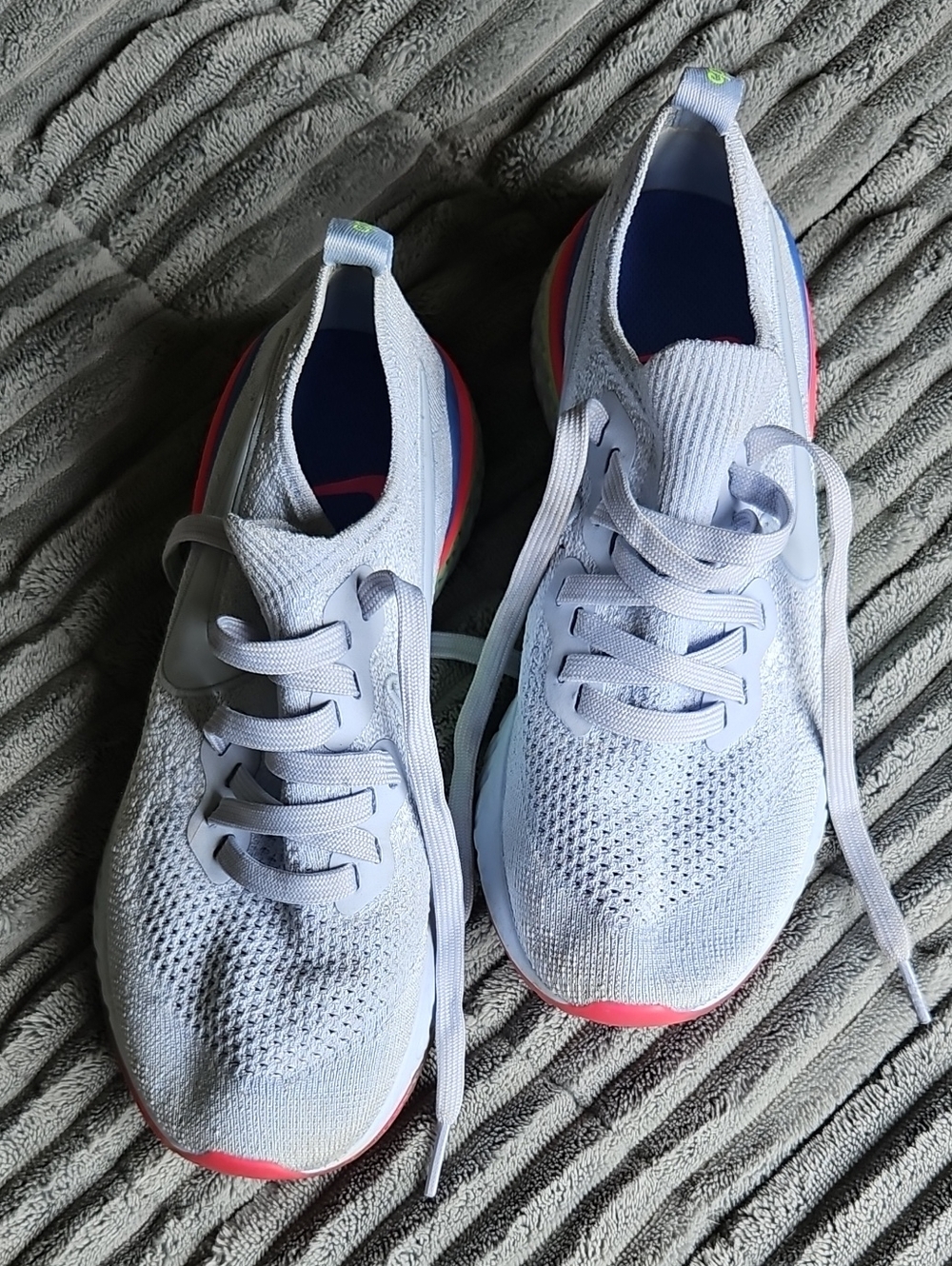 Nike Women's Epic React Flyknit Sneakers with Coral Highlights